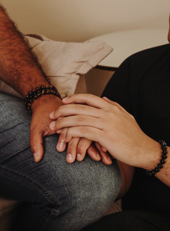 Supportive hand holding, comfort and connection